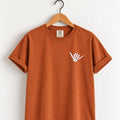Shaka skeleton hand embroidered tee in Yam on a wooden hanger
