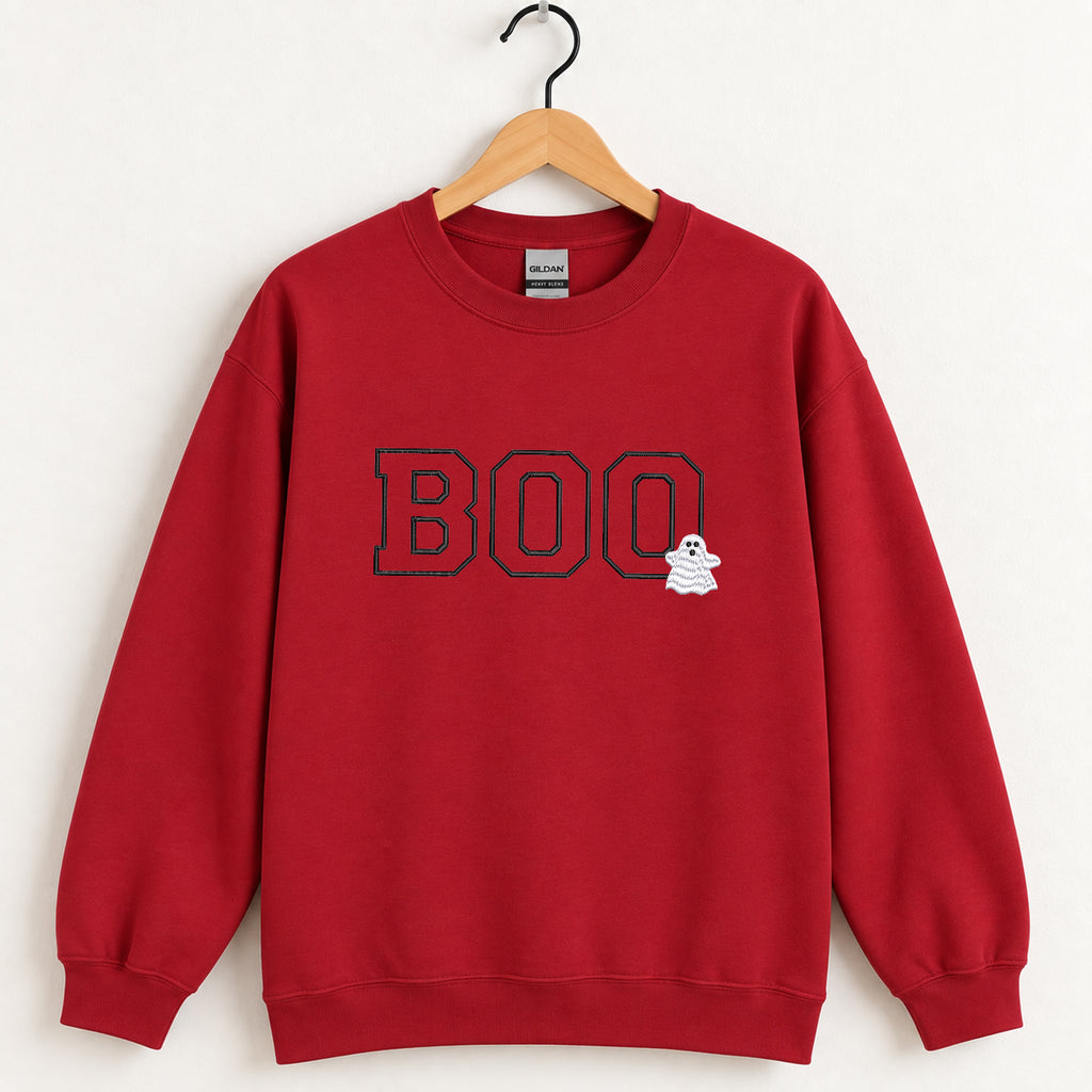 Boo embroidered crewneck sweatshirt in Cardinal Red on a wooden hanger