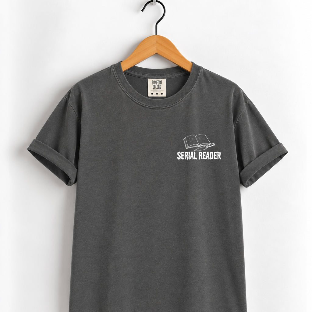 Serial Reader tee in Pepper on a wooden hanger
