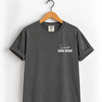 Serial Reader tee in Pepper on a wooden hanger