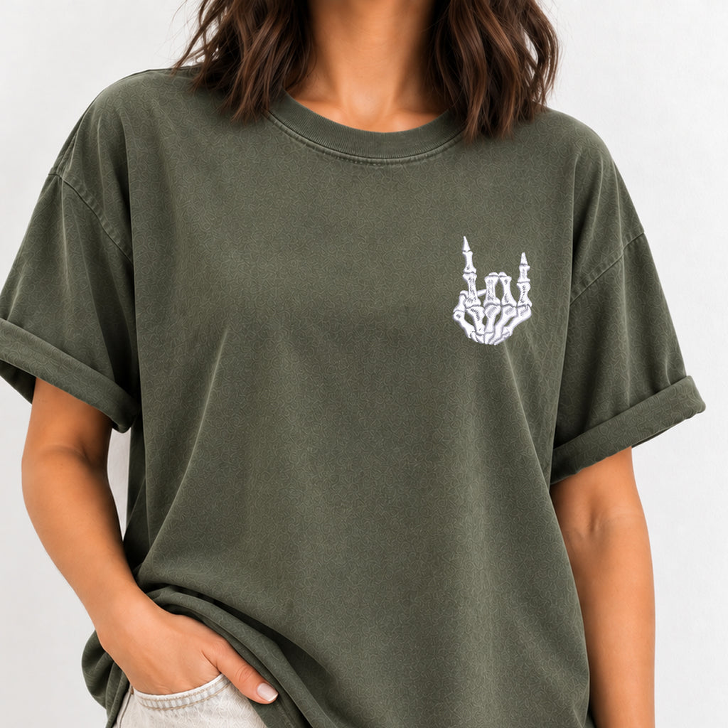 Woman wearing the rock on skeleton hand embroidered tee in Moss