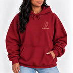 Woman wearing the Here for the Boos hoodie in Cardinal Red with jeans