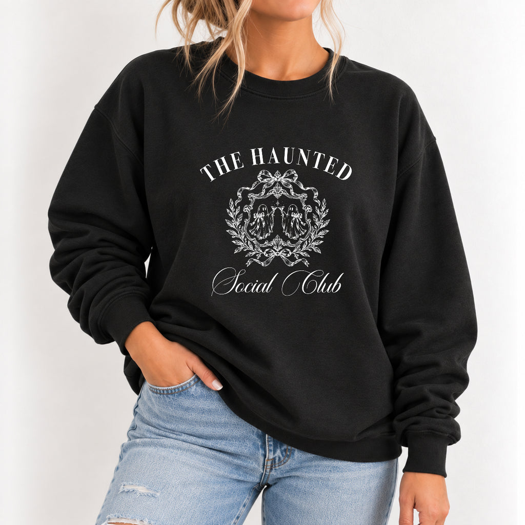 Woman wearing The Haunted Social Club crewneck sweatshirt in Black with jeans