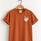 Rock on skeleton hand embroidered tee in Yam on a wooden hanger