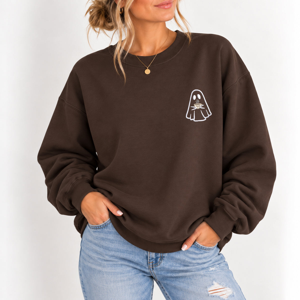 Woman wearing the ghost with a drink embroidered crewneck sweatshirt in Dark Chocolate with jeans