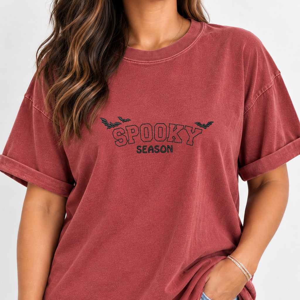 Woman wearing the Spooky Season embroidered bats tee in Chili