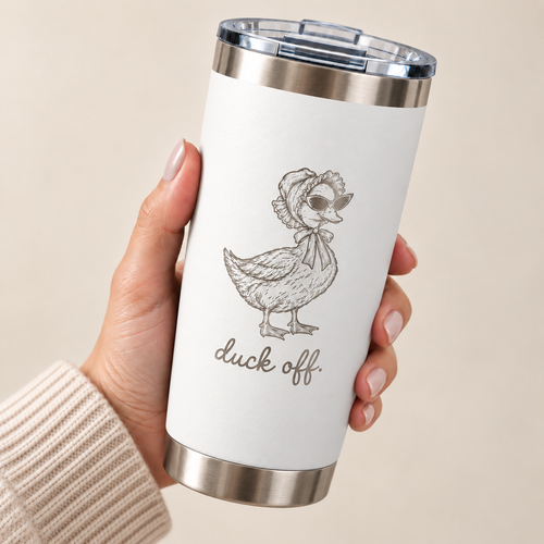 Hand holding the Duck Off engraved 20 oz tumbler in White, silver engraved duck in a bonnet