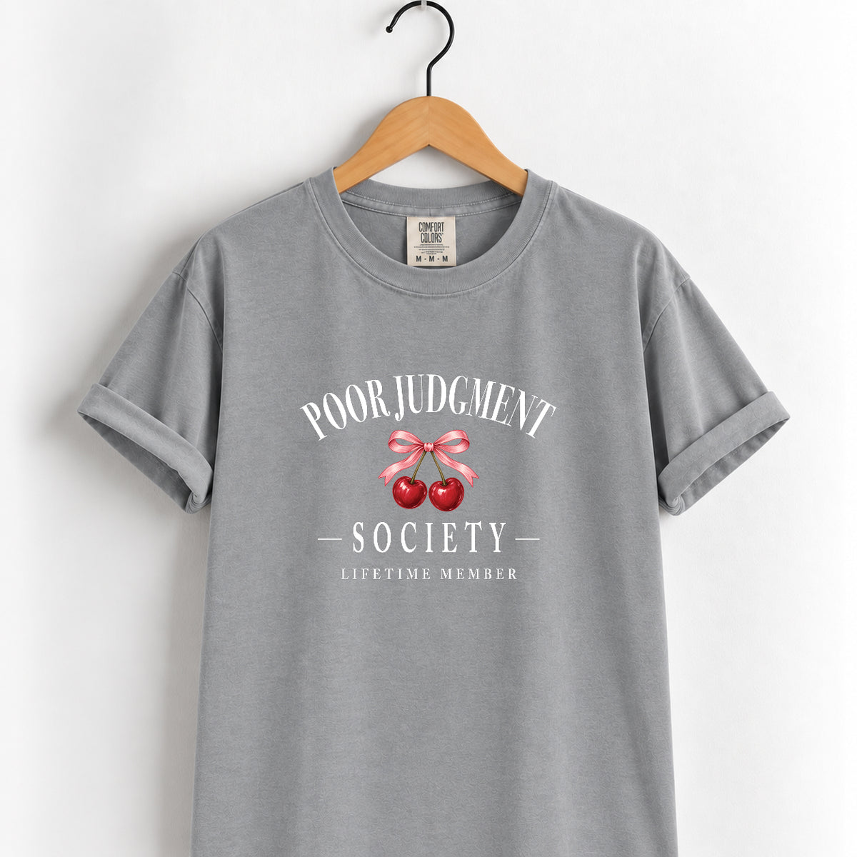 Poor Judgment Society Lifetime Member tee in Grey on a wooden hanger