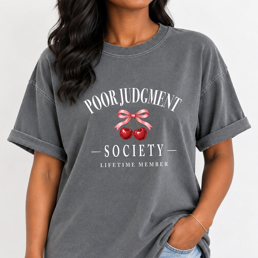 Woman wearing the Poor Judgment Society Lifetime Member tee in Grey