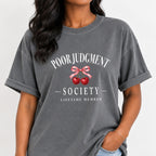 Woman wearing the Poor Judgment Society Lifetime Member tee in Grey