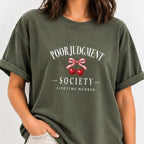 Woman wearing the Poor Judgment Society Lifetime Member tee in Moss