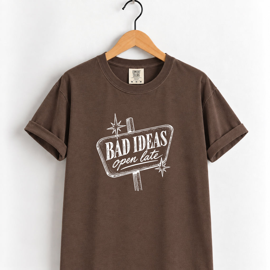 Bad Ideas, Open Late retro sign tee in Espresso on a wooden hanger, printed in cream