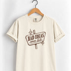 Bad Ideas, Open Late retro sign tee in Ivory on a wooden hanger, printed in vintage brown