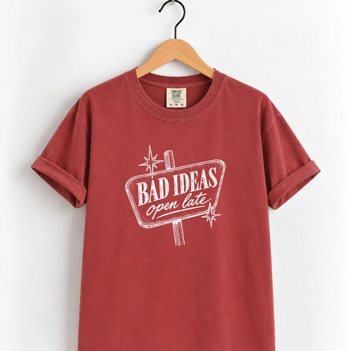 Bad Ideas, Open Late retro sign tee in Chili on a wooden hanger